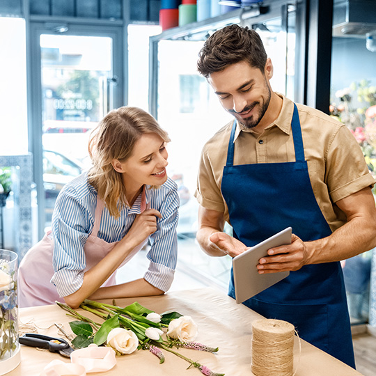 Florists working on a tablet