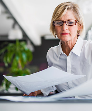 woman looking at documents