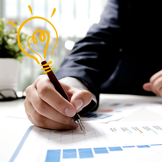 man typing in his tablet