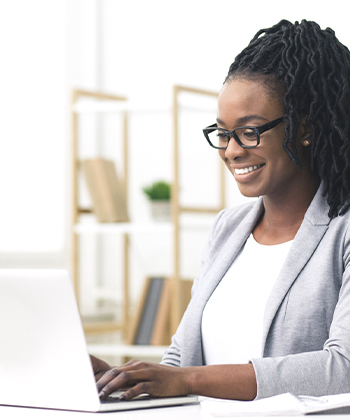 woman typing in a computer